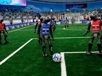 Robots play soccer at the World Humanoid Robot Games in Beijing, China, Friday, Aug. 15, 2025. Robots play soccer at the World Humanoid Robot Games in Beijing, China, Friday, Aug. 15, 2025.