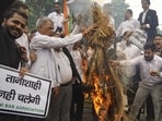 Lawyers protesting at Tis Hazari Courts Complex on Monday. (PTI) Lawyers protesting at Tis Hazari Courts Complex on Monday. (PTI)