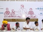 Tamil Nadu chief minister MK Stalin, his Punjab counterpart Bhagwant Mann and deputy CM Udhayanidhi Stalin eat with students during the inauguration of the expansion of ‘Chief Minister’s Breakfast Scheme’ in Chennai on Tuesday (PTI)