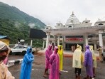 People at the premises of the entry gate for the Vaishno Devi Temple after the yatra was temporarily suspended following a landslide and heavy rainfall, at Katra, in Reasi district, Jammu and Kashmir, Wednesday, Aug. 27, 2025. People at the premises of the entry gate for the Vaishno Devi Temple after the yatra was temporarily suspended following a landslide and heavy rainfall, at Katra, in Reasi district, Jammu and Kashmir, Wednesday, Aug. 27, 2025.
