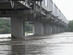 Water level of Yamuna river increasing at Yamuna Bazar near Nigam Bodh Ghat, after large quantity of water is being released every hour from the Wazirabad and Hathnikund barrages, which is pushing the water level up. 