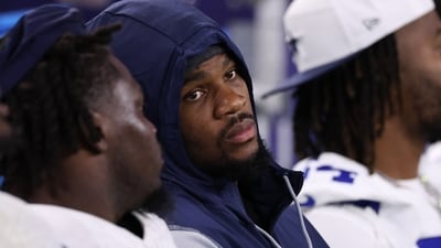 Micah Parsons #11 of the Dallas Cowboys looks on from his team's bench during the first half of the NFL Preseason 2025 game against the Falcons (Getty Images via AFP)