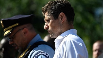 Minneapolis Police Chief Brian O'Hara (L) and Mayor Jacob Frey look on during a press conference following a mass shooting at Annunciation Catholic Church (Getty Images via AFP)