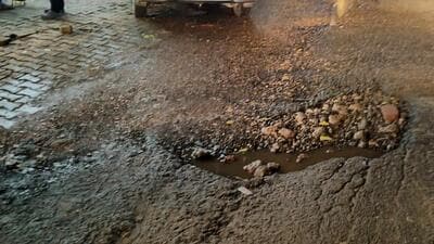 The damaged main road in Sector 49. (HT Photo)