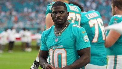 Miami Dolphins wide receiver Tyreek Hill (10) stands on the sidelines before an NFL preseason football game against the Jacksonville Jaguars (AP) Miami Dolphins wide receiver Tyreek Hill (10) stands on the sidelines before an NFL preseason football game against the Jacksonville Jaguars (AP)