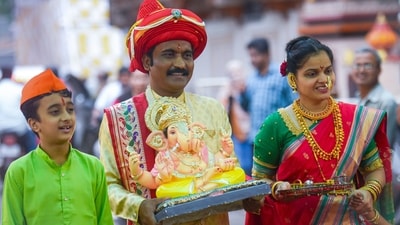 Visuals showed people carrying idols of Lord Ganesh dressed in traditional attire on the eve of Ganesh Chaturthi in Pune, Maharashtra (PTI) Visuals showed people carrying idols of Lord Ganesh dressed in traditional attire on the eve of Ganesh Chaturthi in Pune, Maharashtra (PTI)
