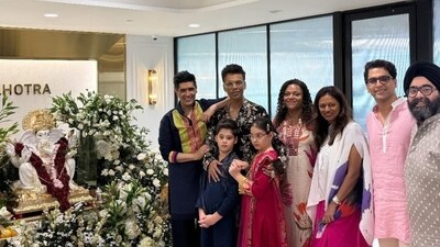 Karan Johar brought his kids Yash and Roohi to attend the Ganesh Chaturthi celebrations at Manish Malhotra's residence. Karan Johar brought his kids Yash and Roohi to attend the Ganesh Chaturthi celebrations at Manish Malhotra's residence.
