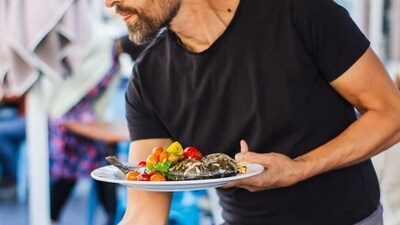 The 2017 legislation regulates working hours for employees in places such as shops, hotels and entertainment venues, among others. (Unsplash/Representative) The 2017 legislation regulates working hours for employees in places such as shops, hotels and entertainment venues, among others. (Unsplash/Representative)