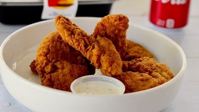 US Open 2025: COQODAQ, a Korean-inspired fried chicken restaurant, is selling six-piece chicken nuggets for $100. (Representative image/Unsplash) US Open 2025: COQODAQ, a Korean-inspired fried chicken restaurant, is selling six-piece chicken nuggets for $100. (Representative image/Unsplash)