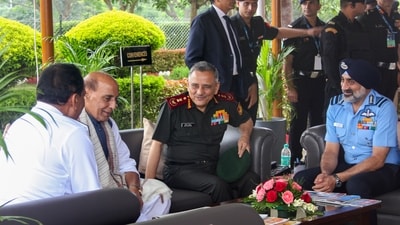Defence Minister Rajnath Singh, Chief of Defence Staff (CDS) General Anil Chauhan and Chief of the Air Staff (CAS) Air Chief Marshal AP Singh during the 'RAN SAMWAD 2025', at Army War College, in Mhow on Wednesday, August 27, 2025. (PTI)