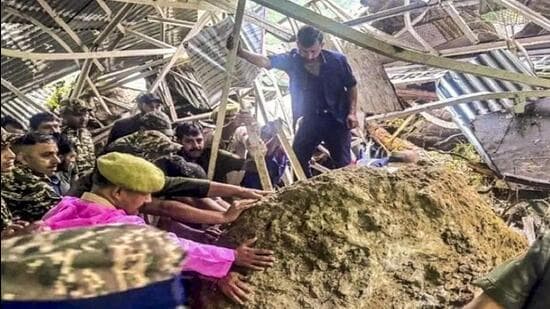 Security personnel at the site of the landslide en route to the Vaishno Devi shrine in Katra of Reasi district on Tuesday. (PTI Photo)