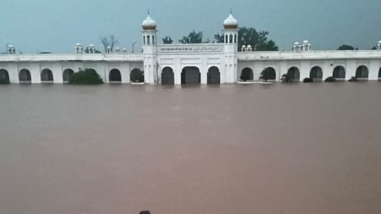 Gurdwara Sri Kartarpur Sahib, Punjab, Pakistan inundated in rainwater after intense downpour (Surjit Singh/Hindustan Times)