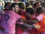A jubilant Lionel Messi and Telasco Segovia are mobbed by Inter Miami teammates. A jubilant Lionel Messi and Telasco Segovia are mobbed by Inter Miami teammates.