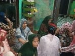 Family and relatives await the arrival of the deceased at their residence in Agra (HT )