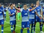 File image of Bengaluru FC captain Sunil Chhetri (C) celebrating with his teammates after their victory against Atletico de Kolkata at the end of their Hero Indian Super League (ISL) in 2018. (AFP)