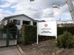An Iranian flag flutters outside the Embassy of the Islamic Republic of Iran in Canberra, Australia