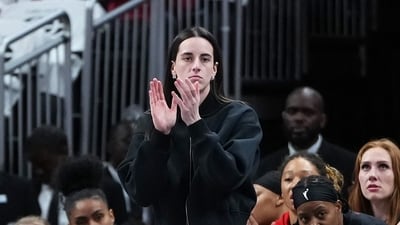 Caitlin Clark #22 of the Indiana Fever reacts on the bench in the first quarter against the Seattle Storm (Getty Images via AFP) Caitlin Clark #22 of the Indiana Fever reacts on the bench in the first quarter against the Seattle Storm (Getty Images via AFP)