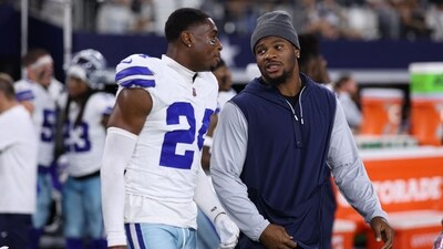 Israel Mukuamu #24 and Micah Parsons #11 of the Dallas Cowboys talk after the NFL Preseason game against the Atlanta Falcons (Getty Images via AFP)