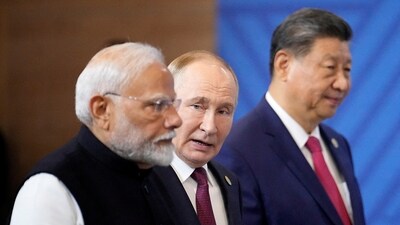 Prime Minister Narendra Modi, Russian President Vladimir Putin and Chinese President Xi Jinping attend a family photo ceremony prior to the BRICS Summit plenary session in Kazan, Russia, Wednesday, Oct. 23, 2024. (Reuters)