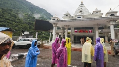 People at the entry gate for the Vaishno Devi Temple after the ‘yatra’ was temporarily suspended following a landslide and heavy rainfall, at Katra. (HT_PRINT) People at the entry gate for the Vaishno Devi Temple after the ‘yatra’ was temporarily suspended following a landslide and heavy rainfall, at Katra. (HT_PRINT)