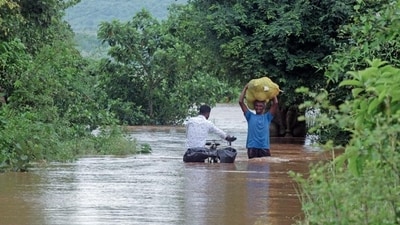 The local people, who rescued them, said that the three failed to maintain the balance of the motorcycle due to the floodwater currents. (Representational Photo/ANI) The local people, who rescued them, said that the three failed to maintain the balance of the motorcycle due to the floodwater currents. (Representational Photo/ANI)