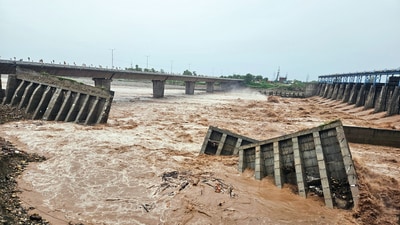 A road near the fourth Tawi Bridge washes away following continuous heavy rains in Jammu. (Gourav/ANI) A road near the fourth Tawi Bridge washes away following continuous heavy rains in Jammu. (Gourav/ANI)
