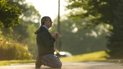 Tim Barr pauses in prayer outside Annunciation Catholic Church on Thursday, following Wednesday’s tragic school shooting in Minneapolis. (AP Photo/Abbie Parr) (AP) Tim Barr pauses in prayer outside Annunciation Catholic Church on Thursday, following Wednesday’s tragic school shooting in Minneapolis. (AP Photo/Abbie Parr) (AP)