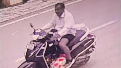 The accused, Sharan Singh, was caught on camera taking the torso of his nephew on his scooter. (Sourced) The accused, Sharan Singh, was caught on camera taking the torso of his nephew on his scooter. (Sourced)