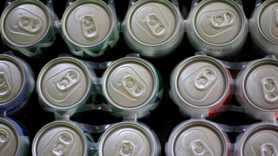 FILE PHOTO: Beer cans are displayed in a store in Ciudad Juarez, Mexico (REUTERS)
