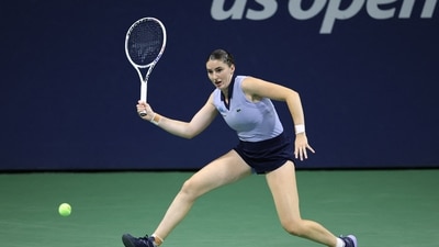 France's Elsa Jacquemot scored her first win in the 2025 US Open tennis tournament wearing a sleeveless, collared powder blue top and navy blue shorts from Lacoste. (AFP) France's Elsa Jacquemot scored her first win in the 2025 US Open tennis tournament wearing a sleeveless, collared powder blue top and navy blue shorts from Lacoste. (AFP)