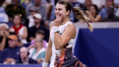 Iva Jovic from the US went up against Italy's Jasmine Paolini wearing the Y-3 Tennis Pro dress from Adidas' Y-3 collection, which features a sleek, body-hugging fit and artistic flame-like prints in earthy tones of rust, brown, and black along one side. (AFP) Iva Jovic from the US went up against Italy's Jasmine Paolini wearing the Y-3 Tennis Pro dress from Adidas' Y-3 collection, which features a sleek, body-hugging fit and artistic flame-like prints in earthy tones of rust, brown, and black along one side. (AFP)