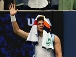 Ben Shelton of the U.S. looks dejected after retiring from his match against France's Adrian Mannarino due to injury 