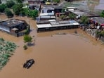 Partially submerged houses at a flood-ravaged area in Gurdaspur . (PTI) Partially submerged houses at a flood-ravaged area in Gurdaspur . (PTI)