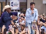 Al Roker joins Role Model (Tucker Pillsbury) onstage on NBC's Today show at Rockefeller Plaza on Friday, August 29 in New York. Al Roker joins Role Model (Tucker Pillsbury) onstage on NBC's Today show at Rockefeller Plaza on Friday, August 29 in New York.