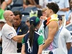 USA's Ben Shelton and France's Adrian Mannarino shake hands after Shelton retired during their men's singles third round match on day six of the US Open