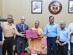 The three-member panel submits a 450-page investigation report on the Sambhal violence to Uttar Pradesh chief minister Yogi Adityanath, in Lucknow on Thursday. (Information Department, UP/ANI Photo) The three-member panel submits a 450-page investigation report on the Sambhal violence to Uttar Pradesh chief minister Yogi Adityanath, in Lucknow on Thursday. (Information Department, UP/ANI Photo)
