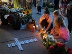 Jen Labanowski, her daughter Lucy (R), and her daughter's friend Cece Degnan (C), light candles at a memorial for victims of yesterday's shooting in front of Annunciation Catholic Church on August 28, 2025 in Minneapolis, Minnesota. (Photo by SCOTT OLSON / GETTY IMAGES NORTH AMERICA / Getty Images via AFP) Jen Labanowski, her daughter Lucy (R), and her daughter's friend Cece Degnan (C), light candles at a memorial for victims of yesterday's shooting in front of Annunciation Catholic Church on August 28, 2025 in Minneapolis, Minnesota. (Photo by SCOTT OLSON / GETTY IMAGES NORTH AMERICA / Getty Images via AFP)
