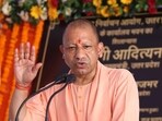 Uttar Pradesh chief minister Yogi Adityanath addressing a gathering after laying the foundation stone of the State Election Commission building in Lucknow on Friday. (HT Photo) Uttar Pradesh chief minister Yogi Adityanath addressing a gathering after laying the foundation stone of the State Election Commission building in Lucknow on Friday. (HT Photo)