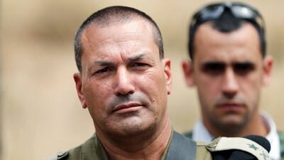 (FILES) Israeli army's lieutenant general Eyal Zamir looks on as he stands near the Israel-Gaza border in the southern kibbutz of Nahal Oz on April 20, 2018. (AFP) (FILES) Israeli army's lieutenant general Eyal Zamir looks on as he stands near the Israel-Gaza border in the southern kibbutz of Nahal Oz on April 20, 2018. (AFP)