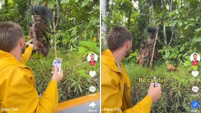 Irish YouTuber Dara Tah offering salt to a member of a "cannibal" tribe in Papua. (TikTok@daratah) Irish YouTuber Dara Tah offering salt to a member of a "cannibal" tribe in Papua. (TikTok@daratah)