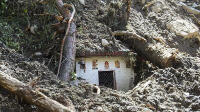 Debris scattered around a disaster-hit area following heavy rainfall in Chamoli, Uttarakhand, on Sunday. (PTI) Debris scattered around a disaster-hit area following heavy rainfall in Chamoli, Uttarakhand, on Sunday. (PTI)