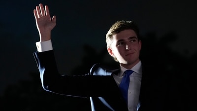 Despite his family's public life, Barron Trump prefers privacy; this summer he engaged in business ventures and is reportedly interested in carving his own career path. (AP/Rebecca Blackwell)