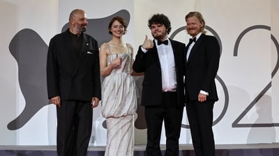 Director Yorgos Lanthimos, Emma Stone, Aidan Delbis and Jesse Plemons pose on the red carpet for the screening of Bugonia in competition, at the 82nd Venice Film Festival, in Venice, Italy. (REUTERS)