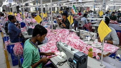 A textile factory in Bhiwandi near Mumbai. India's GDP data is likely to show excessive front-loading of exports before US tariffs took effect. (AFP) A textile factory in Bhiwandi near Mumbai. India's GDP data is likely to show excessive front-loading of exports before US tariffs took effect. (AFP)