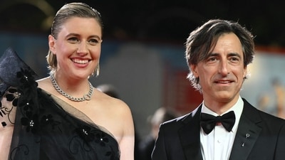 Filmmaker Greta Gerwig and director Noah Baumbach walked the red carpet before the screening of Jay Kelly at Venice Lido. (AFP) Filmmaker Greta Gerwig and director Noah Baumbach walked the red carpet before the screening of Jay Kelly at Venice Lido. (AFP)