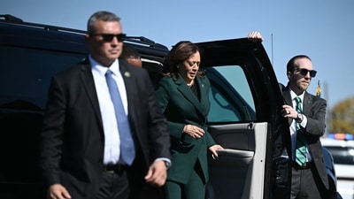 Former US Vice President and Democratic presidential candidate Kamala Harris arrives to board Air Force Two at Philadelphia International Airport in Philadelphia, Pennsylvania, on October 21, 2024. (AFP) Former US Vice President and Democratic presidential candidate Kamala Harris arrives to board Air Force Two at Philadelphia International Airport in Philadelphia, Pennsylvania, on October 21, 2024. (AFP)