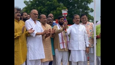 MP Dinesh Sharma and former minister Kaushal Kishore at the function in Lucknow on Friday (HT Photo)