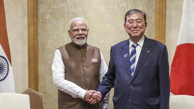 PM Narendra Modi with his Japanese counterpart Shigeru Ishiba during the India-Japan Economic Forum in Tokyo. (PMO) PM Narendra Modi with his Japanese counterpart Shigeru Ishiba during the India-Japan Economic Forum in Tokyo. (PMO)