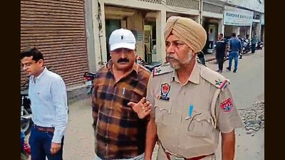 Police inspecting the crime spot on Friday. (HT Photo)