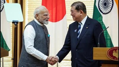 Prime Minister Narendra Modi and Japan's Prime Minister Shigeru Ishiba shake hands during a joint press conference in Tokyo, Japan August 29 (via REUTERS)